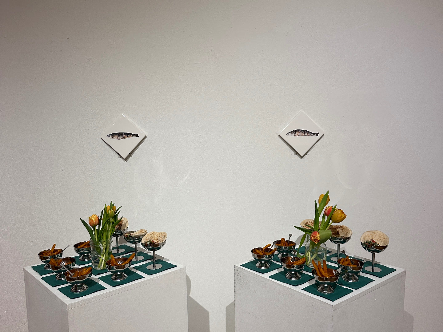 Plinths with tiles, tulips, and the first course.
